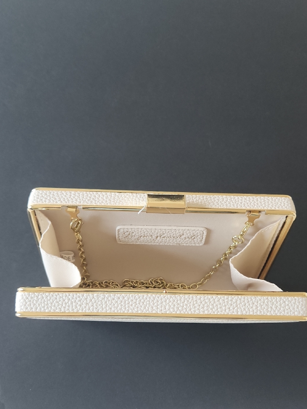 Elegant White Gold-Trim Evening Clutch